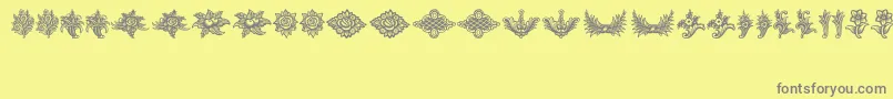 SchlussVignetten-Schriftart – Graue Schriften auf gelbem Hintergrund