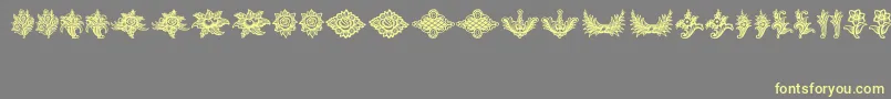 SchlussVignetten Font – Yellow Fonts on Gray Background