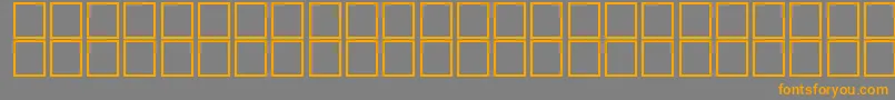 フォントAlKharashi26 – オレンジの文字は灰色の背景にあります。