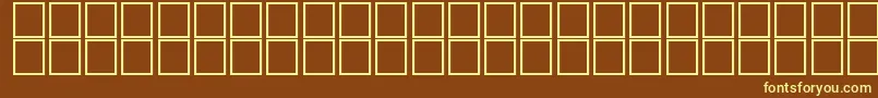 AlKharashi26-fontti – keltaiset fontit ruskealla taustalla