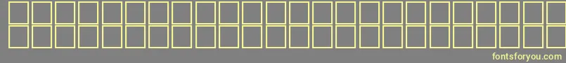フォントAlKharashi26 – 黄色のフォント、灰色の背景