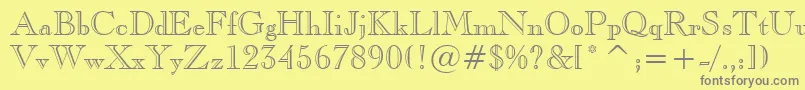 フォントCaslonOpenfaceBt – 黄色の背景に灰色の文字