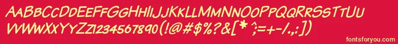 KomikaTextKapsItalic Font – Yellow Fonts on Red Background