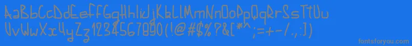 Pwaugustbold-fontti – harmaat kirjasimet sinisellä taustalla