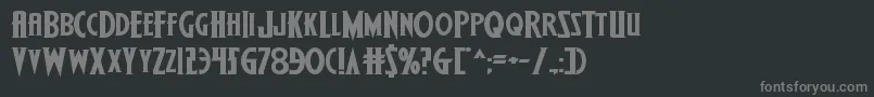 Wolfsbane2iiexpand-fontti – harmaat kirjasimet mustalla taustalla