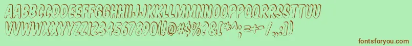 フォントKomikaTitleShadow – 緑の背景に茶色のフォント