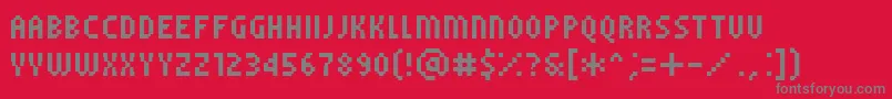Fonte PfTempestaFiveCompressed – fontes cinzas em um fundo vermelho