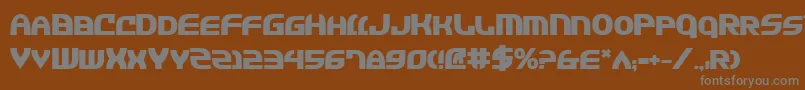 JannisariesBold-fontti – harmaat kirjasimet ruskealla taustalla