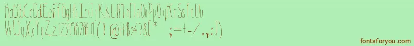 Indiferente Font – Brown Fonts on Green Background