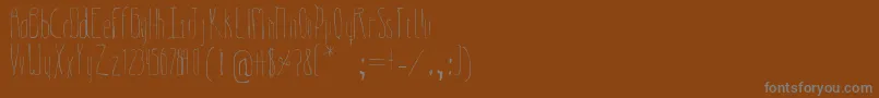 フォントIndiferente – 茶色の背景に灰色の文字