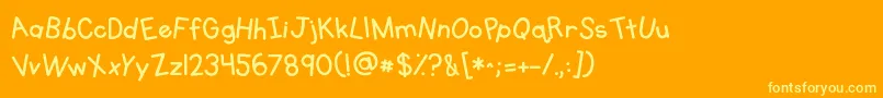 Fonte Kgprimarywhimsy – fontes amarelas em um fundo laranja
