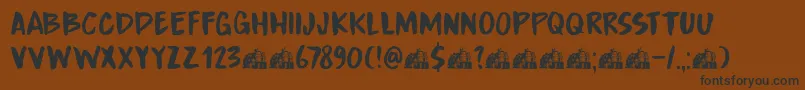 フォントDkBoardingHouseIii – 黒い文字が茶色の背景にあります