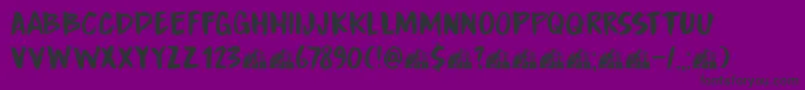 Czcionka DkBoardingHouseIii – czarne czcionki na fioletowym tle