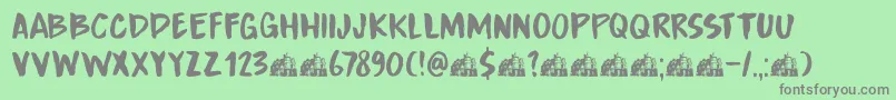 DkBoardingHouseIii-Schriftart – Graue Schriften auf grünem Hintergrund