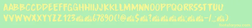 フォントDkBoardingHouseIii – 黄色の文字が緑の背景にあります