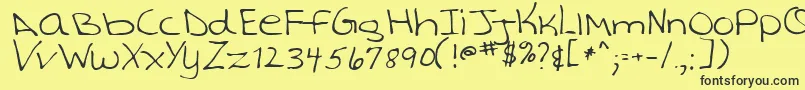 TashaRegular Font – Black Fonts on Yellow Background