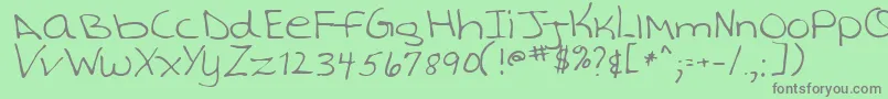 TashaRegular-Schriftart – Graue Schriften auf grünem Hintergrund