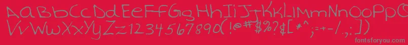 TashaRegular-Schriftart – Graue Schriften auf rotem Hintergrund