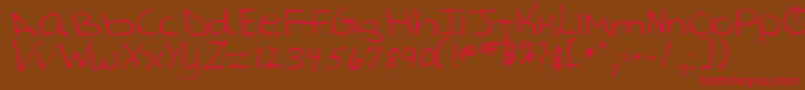 TashaRegular Font – Red Fonts on Brown Background