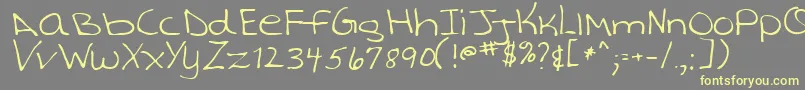 TashaRegular Font – Yellow Fonts on Gray Background