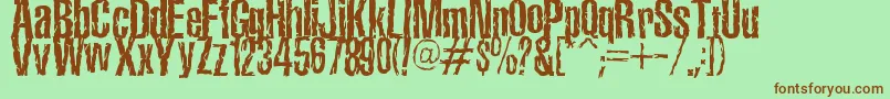 TerroramaChiseled Font – Brown Fonts on Green Background