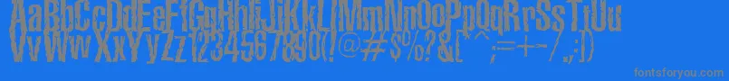 TerroramaChiseled-fontti – harmaat kirjasimet sinisellä taustalla