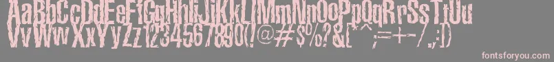 フォントTerroramaChiseled – 灰色の背景にピンクのフォント
