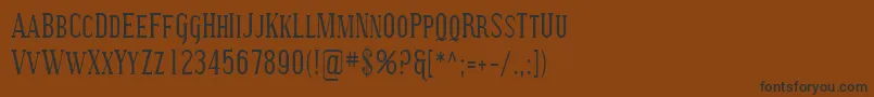 フォントSfcovingtonsccond – 黒い文字が茶色の背景にあります