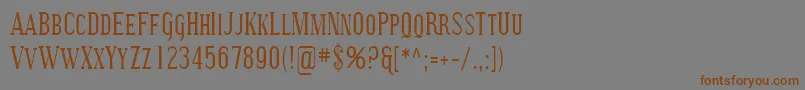 フォントSfcovingtonsccond – 茶色の文字が灰色の背景にあります。