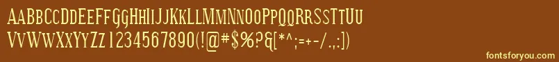 Sfcovingtonsccond-fontti – keltaiset fontit ruskealla taustalla