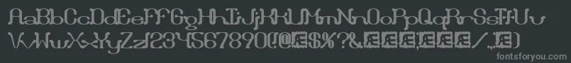 Draggleo-fontti – harmaat kirjasimet mustalla taustalla
