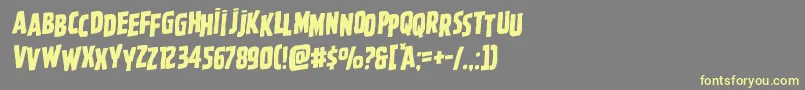 Ghoulishintentshiftrotal Font – Yellow Fonts on Gray Background