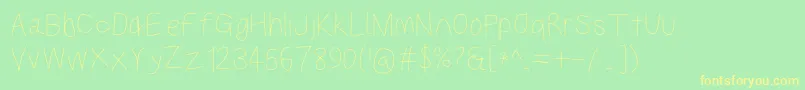 Kabinamed Font – Yellow Fonts on Green Background
