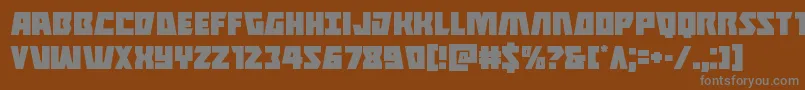 Halfshellhero-fontti – harmaat kirjasimet ruskealla taustalla