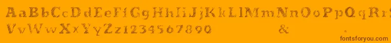 Czcionka Evanescente – brązowe czcionki na pomarańczowym tle