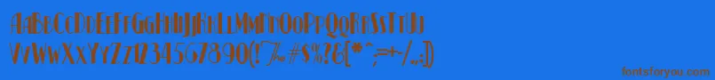 フォントKismetNormal – 茶色の文字が青い背景にあります。