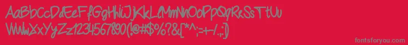 Geschrift-Schriftart – Graue Schriften auf rotem Hintergrund
