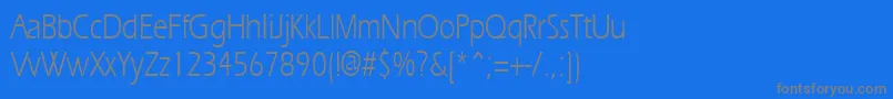フォントErgoecondensedRegular – 青い背景に灰色の文字