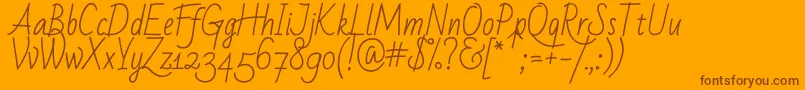Badscript Font – Brown Fonts on Orange Background