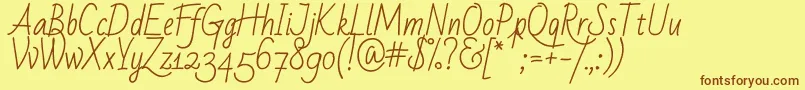 Badscript Font – Brown Fonts on Yellow Background