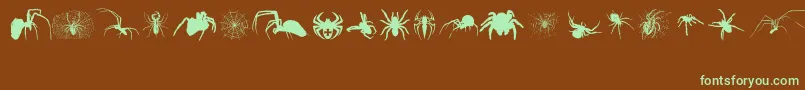 Araneae-Schriftart – Grüne Schriften auf braunem Hintergrund