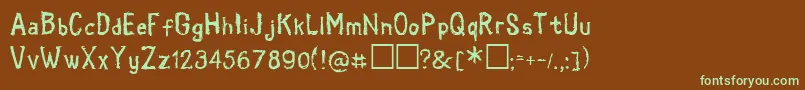 フォントCoold – 緑色の文字が茶色の背景にあります。