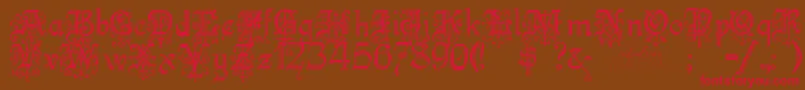 Kellyanngothic Font – Red Fonts on Brown Background