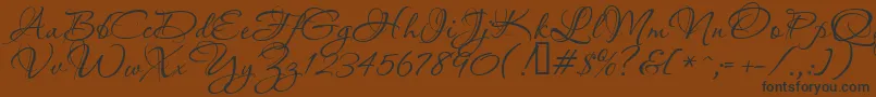 Aquarelle Font – Black Fonts on Brown Background