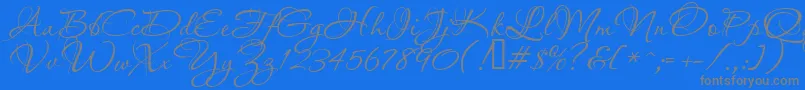 Aquarelle-fontti – harmaat kirjasimet sinisellä taustalla