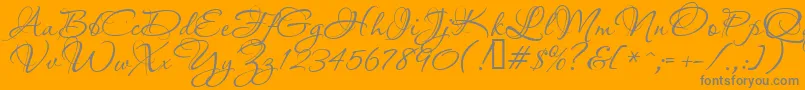 Aquarelle-fontti – harmaat kirjasimet oranssilla taustalla