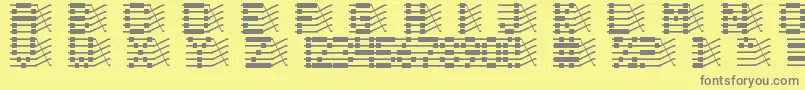 フォントChloriin – 黄色の背景に灰色の文字