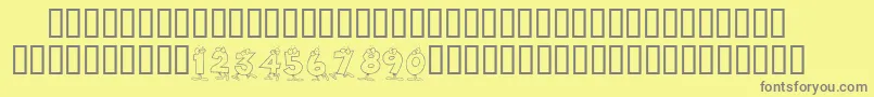 フォントKrToonNumbers – 黄色の背景に灰色の文字