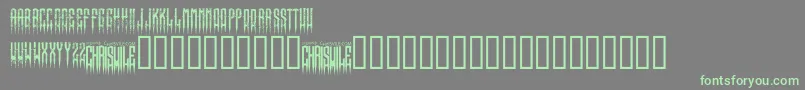 フォントXspikedRegular – 灰色の背景に緑のフォント