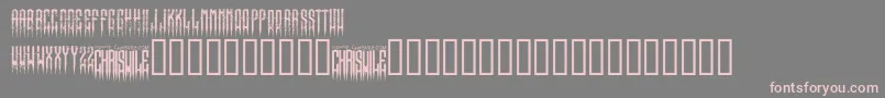フォントXspikedRegular – 灰色の背景にピンクのフォント